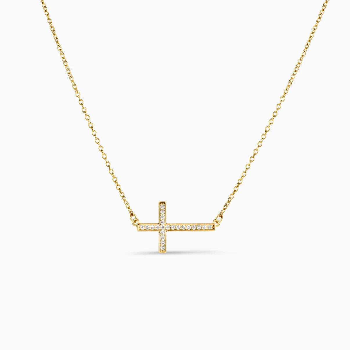 golden cross with paved rhinestones